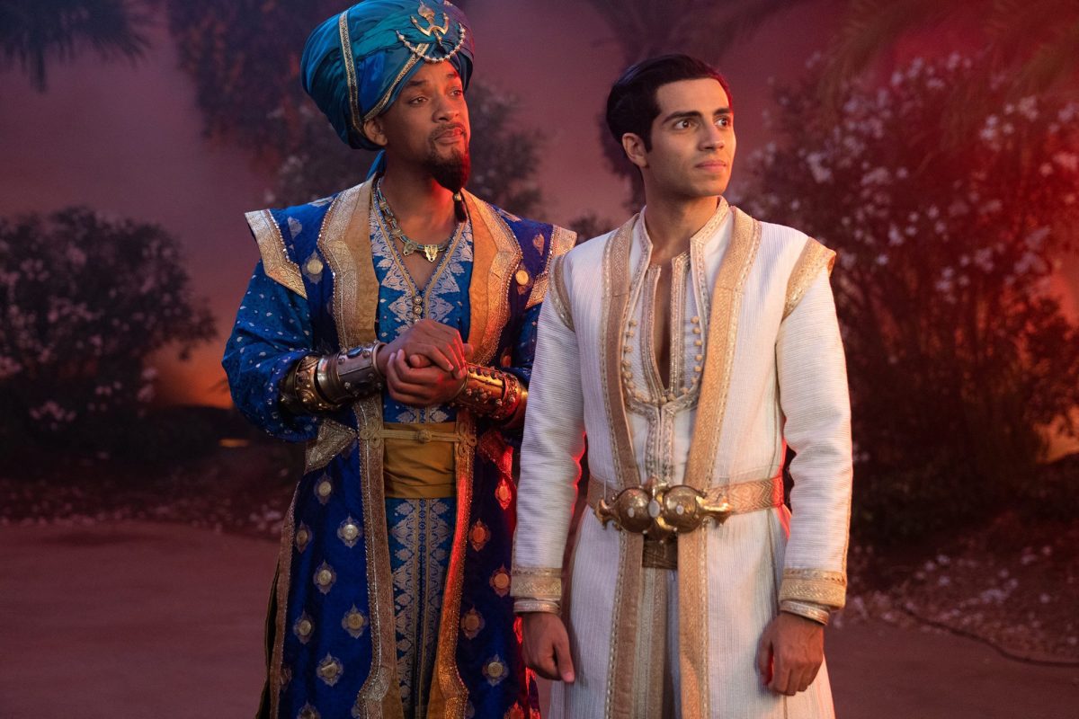 Will Smith as Genie and Mena Massoud as Aladdin in Aladdin